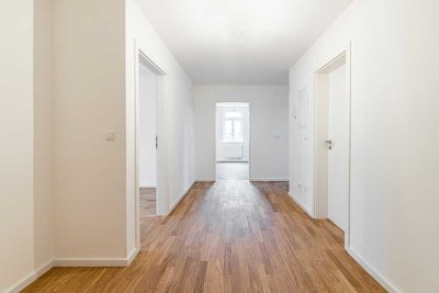 Kapitalanlage mit Stil – helle Dachgeschosswohnung in gefragter Lage mit Gemeinschaftsgarten