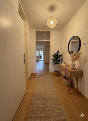 3-Zimmer-Wohnung mit Terrasse, kleinem Garten und offenem Wohn-Essbereich im Untergeschoss