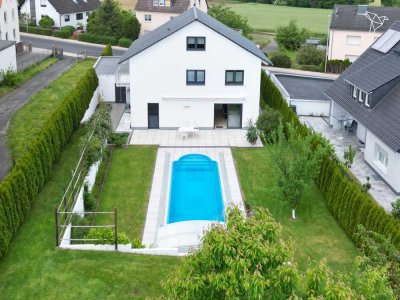 LUXUS TRIFFT TECHNIK � Modernes Traumhaus mit Pool, Sauna & Hightech-Ausstattung!