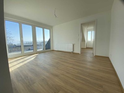 Moderne Dachgeschosswohnung (ohne Aufzug) mit See- und Bergsicht, zentral nähe Lindaupark