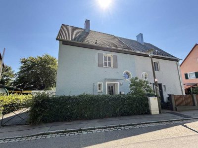 Attraktive Doppelhaushälfte mit Ausbaureserve, Garten und Garage