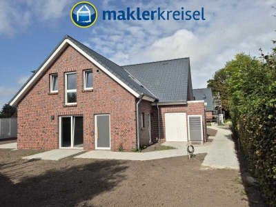 Moderne Haushälfte mit EBK und Garage