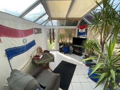 Einfamilienhaus mit Wintergarten, großzügigem Garten und Doppelgarage
