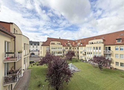 Vermietete Stadtwohnung inklusive Tiefgaragenstellplatz mit Potential