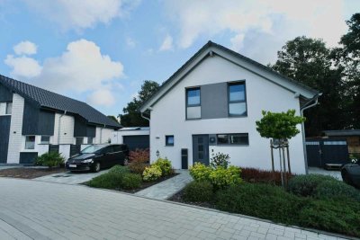 Hier beginnt Ihr neues Kapitel – modernes Zuhause mit traumhaftem Blick ins Grüne!