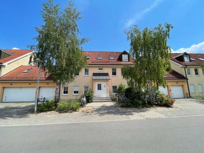 vermietete 3-Zi. OG-Wohnung mit Balkon und Garagenstellplatz
