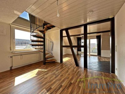 Maisonette mit Charme: Wohnen auf zwei Ebenen mit Kachelofen und Balkon