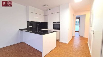 Premium-Lage direkt am Europa-Garten: Hochwertige 3-Zi Terrassenwohnung mit Luxus-EBK und TG