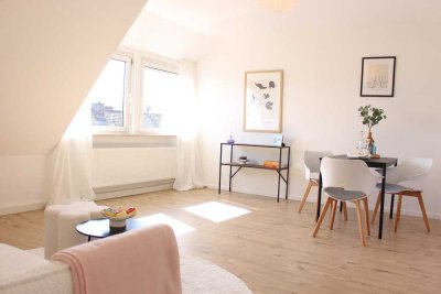 Top-renovierte DG Wohnung mit Garage - ideal für Selbstnutzer oder Kapitalanleger