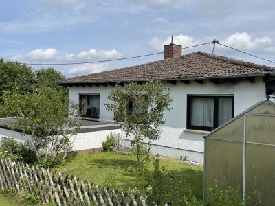 Charmanter Bungalow mit großem Garten und einer vermieteten Einliegerwohnung