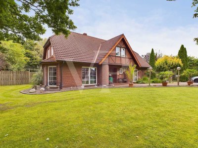Wohlfühlhaus mit Kamin, Einliegerwohnung & parkähnlichem Garten in Rhauderfehn