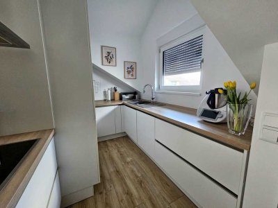 Helle, geräumige 2-Zimmer-Wohnung mit Balkon und Einbauküche in Rodgau