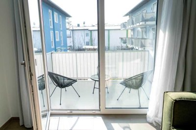 Neuwertige, helle 2-Zimmer Eckwohnung mit großem Balkon in zentraler Lage