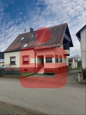 Dreifamilienwohnhaus mit Schreinerwerkstatt