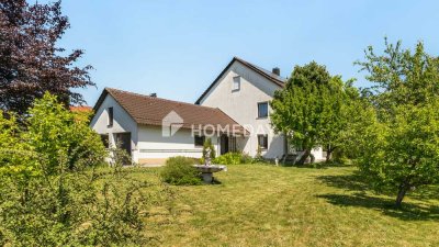 Großzügiges EFH mit herrlichem Garten, zwei Garagen und Photovoltaikanlage – sofort bezugsfrei