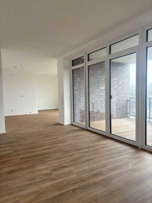 Etagenwohnung im 6-Parteien-Haus mit großer Loggia in Norden - direkt am Norder Tief - zu verkaufen!