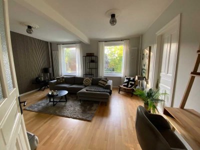 Stilvolle Wohnung mit Wohnküche und Gemeinschaftsgarten