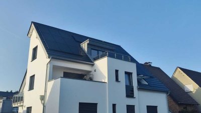 Herrliche 2-Zimmer Neubauwohnung mit Terrasse und Einbauküche in 3-Familienhaus