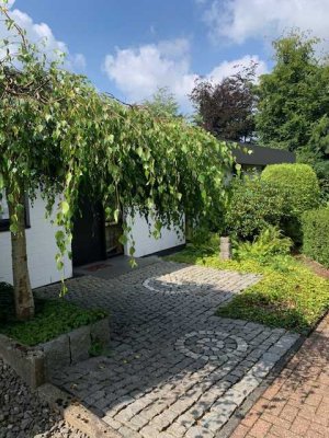 Attraktiver Winkelbungalow auf großzügigem Grundstück in ruhiger Lage mit Abendsonne