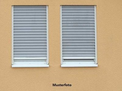 Einfamilien-Doppelhaushälfte mit Anbau und Garage