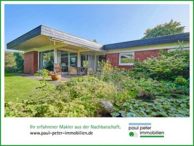 Großzügiger Architekten-Bungalow mit Staffelgeschoss in ruhigster Lage von Neumünster-Gartenstadt