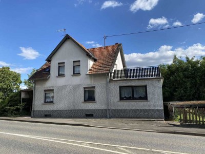 Zweifamilienhaus Ideal für Generationen: Charmantes Zweifamilienhaus mit Potenzial