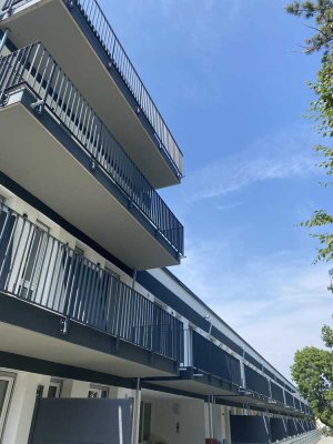 Erstbezug: 2,5 Zimmer Wohnung mit Küche, Dachterrasse und Tiefgarage