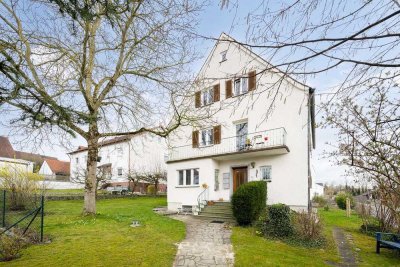 Dreifach Glück in Langenbach! Gut geschnittenes Dreifamilienhaus mit Traum-Garten und Stellplätzen