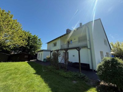 EG-Wohnung mit großem Garten in einem sanierten Zweifamilienwohnhaus mit gehobener Ausstattung