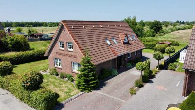 Großzügiges Einfamilienhaus auf traumhaftem Grundstück in Wiesmoor – direkt am Kanal!