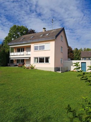 Erdgeschoßwohnung mit Südterrasse, großem Gartenanteil und Garage
