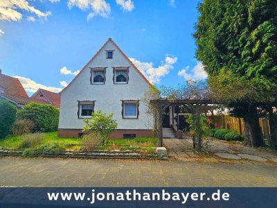 Familienfreundliches Einfamilienhaus mit Vollkeller, Garage und großzügigem Garten