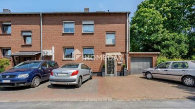 Vielseitiges Reihenendhaus mit Gartenidylle und 3 Garagen in Duisburg-Süd Ungelshein