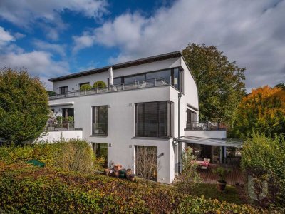 Lichtdurchflutete Wohlfühloase mit Traumgarten und Premiumausstattung