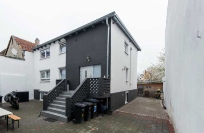Zwei vermietete Häuser auf einem Grundstück