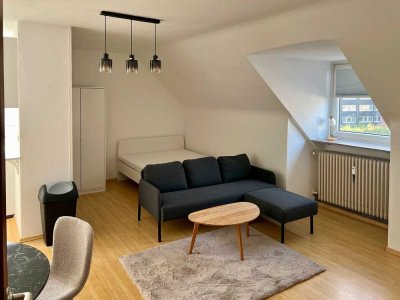 Möblierte Dachgeschoss-Wohnung mit 1,5 Zimmern inkl. Garage!