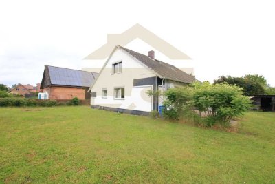Modernes Mehrfamilienhaus mit drei Wohneinheiten und Baugrundstück! Mein Haus = Mein Makler!