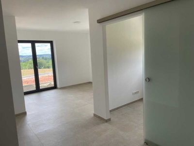 Kleine Neubau-Einliegerwohnung  in wunderschöner Ortsrandlage