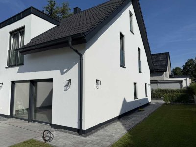 Neubau Doppelhaushälfte A+ mit Keller und Garten in Brockhagen