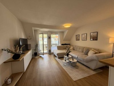 Sehr gepflegte Dachgeschosswohnung in super Lage von Roth