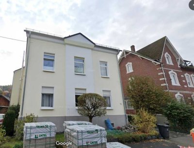 Zentrale Dachgeschosswohnung 3 ZKB incl. Einbauküche und großem Garten