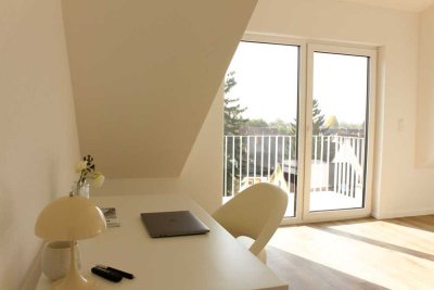 Neubau-Erstbezug: Helle, möblierte 2-Zimmer-Dachgeschosswohnung mit Aussicht