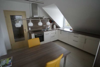 2-Zimmer-Dachgeschosswohnung mit Südbalkon, Garage und Stellplatz