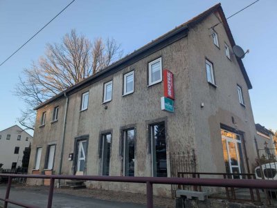 Leben und Arbeiten vereint – Vielseitiges Wohn- und Geschäftshaus in Kirchberg!