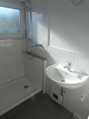 Erstbezug nach Sanierung mit Einbauküche: Freundliche 3-Raum-DG-Wohnung in Leverkusen