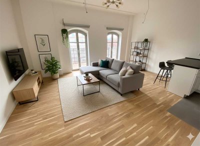 Innenhof-Idylle trifft modernen Wohnkomfort – 2-Zimmer mit EBK und Balkon