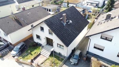Immobilie mit viel Potential für Familien-/Generationenwohnen mit großem West-Südwestgrundstück