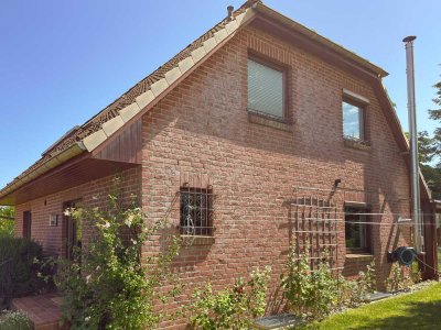 Exklusiv wohnen, smart investieren: Haus mit Wintergarten, Süd-Garten & möglichem Bauplatz – geme...