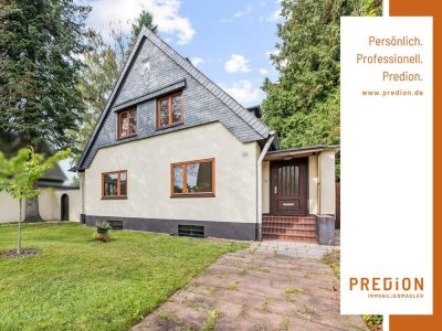 Freistehendes Einfamilienhaus mit Garage und Gartenparadies