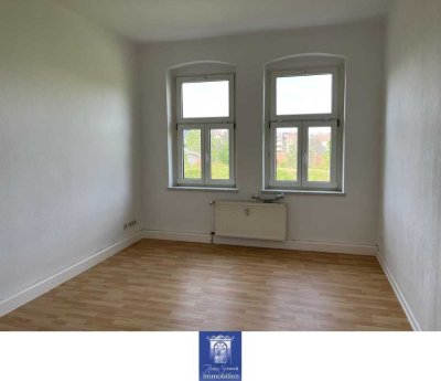 Perfekte Wohlfühlwohnung mit großem Süd-Balkon und grünem Innenhof!